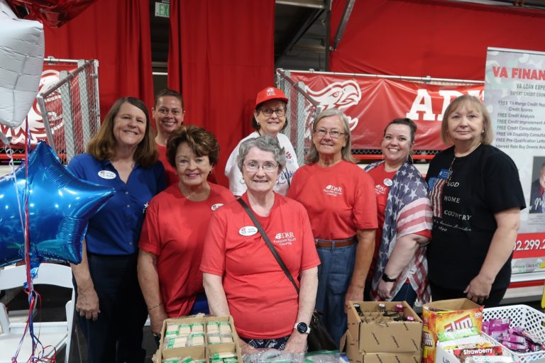 This photo shows members of Paradise Valley Chapter, NSDAR, volunteering at a StandUp for Veterans event.