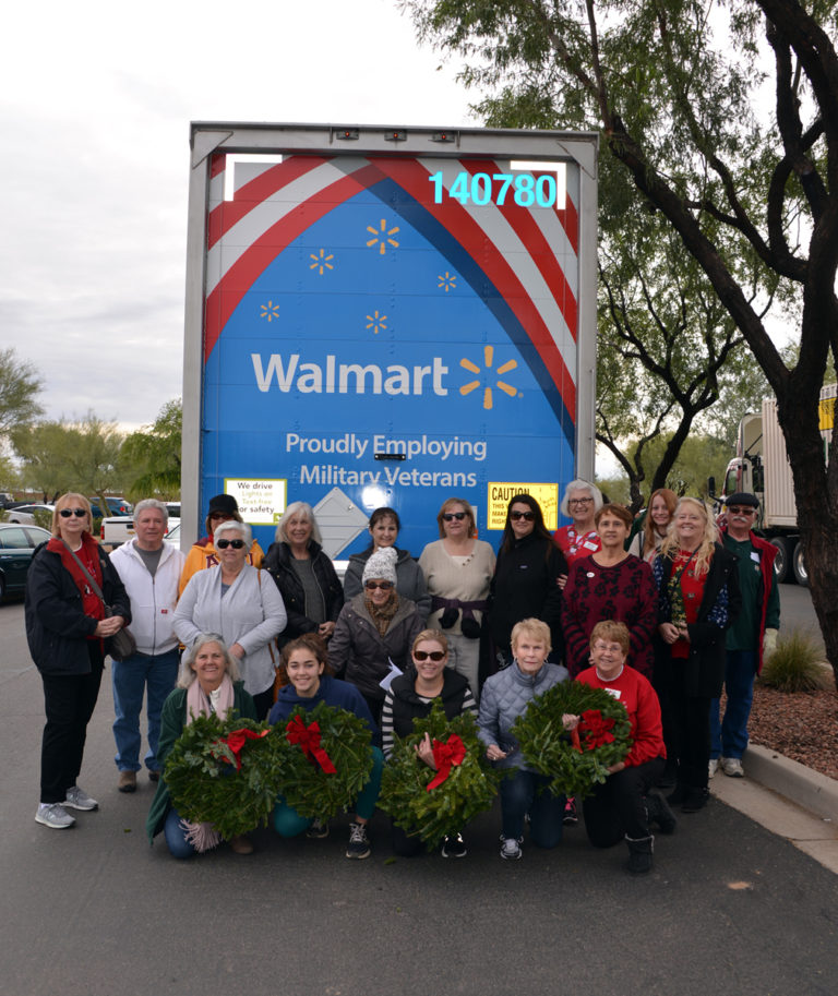 This is a group picture of members of Paradise Valley Chapter, NSDAR, preparing to place wreaths at veterans' graves for Wreaths Across America.
